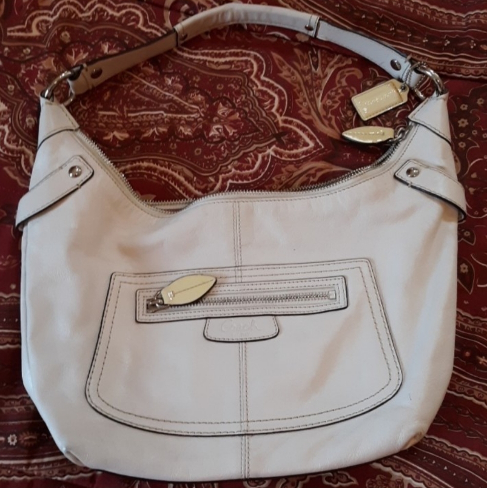 Adorable cream color Coach purse